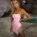 Pink mini dress with spaghetti straps and silver fringe detail at the side
