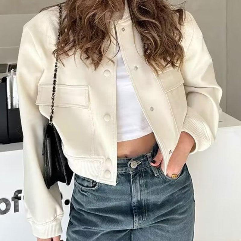 Cream button-up stand-collar jacket with front button placket and two chest pockets