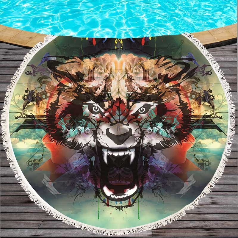 Round beach towel with colorful feathers and tassels