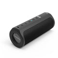 Black portable waterproof Bluetooth speaker with mesh grille and charging port