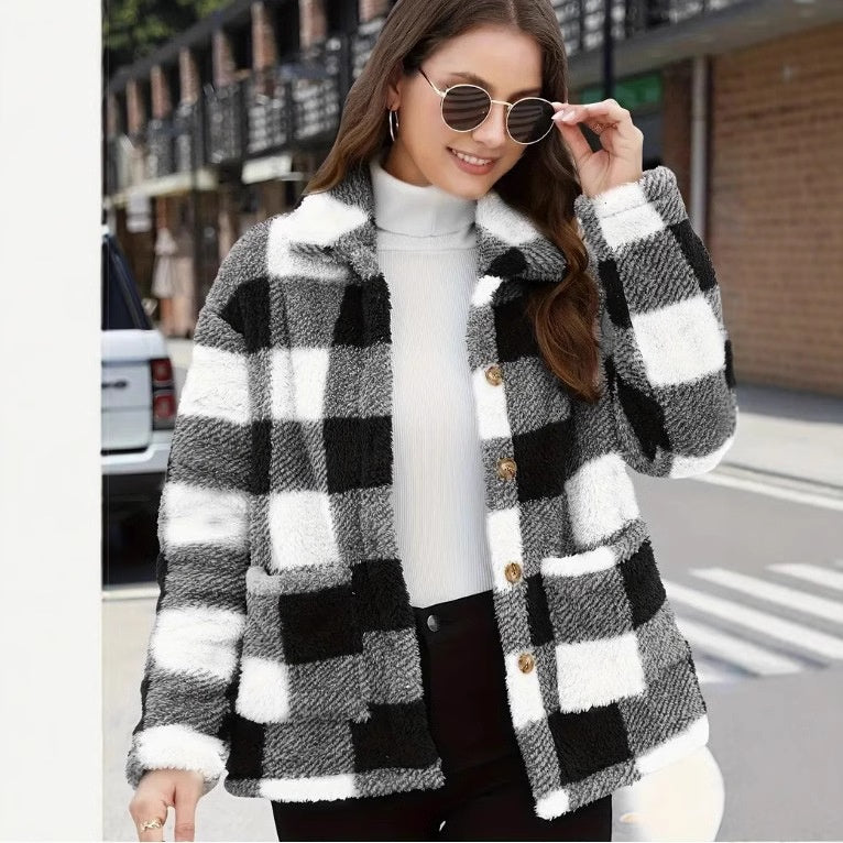Women’s white and black buffalo plaid single-breasted jacket with button front and lapel collar.