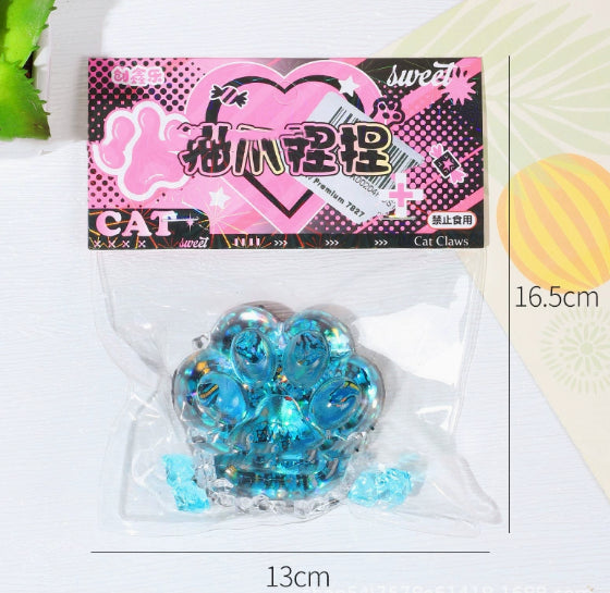 Blue glitter cat paw stress toy in clear blister pack