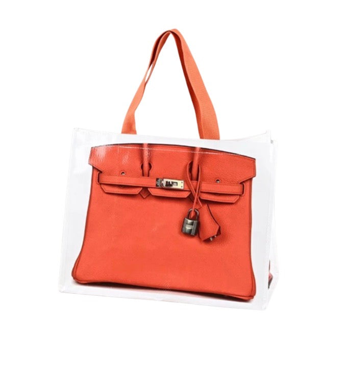 Orange reusable tote bag with two top handles and textured front panel