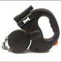 Dual retractable dog leash with LED flashlight, black reel and blue outer handle close-up