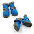 Blue dog winter snow boots with faux fur trim and Velcro strap, grippy rubber sole