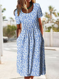 Light blue maxi dress with round neck, short sleeves, and white floral 3D print