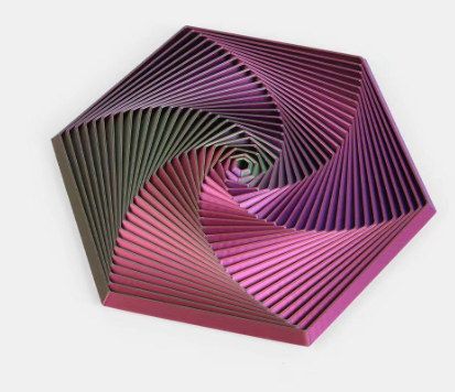 Hexagon sensory fidget toy with pink, purple, and maroon ridged hexagon shape and spiral