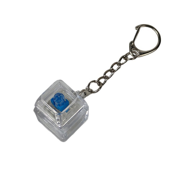 Clear cube stress-relief keychain toy with blue finger-popping button and metal chain