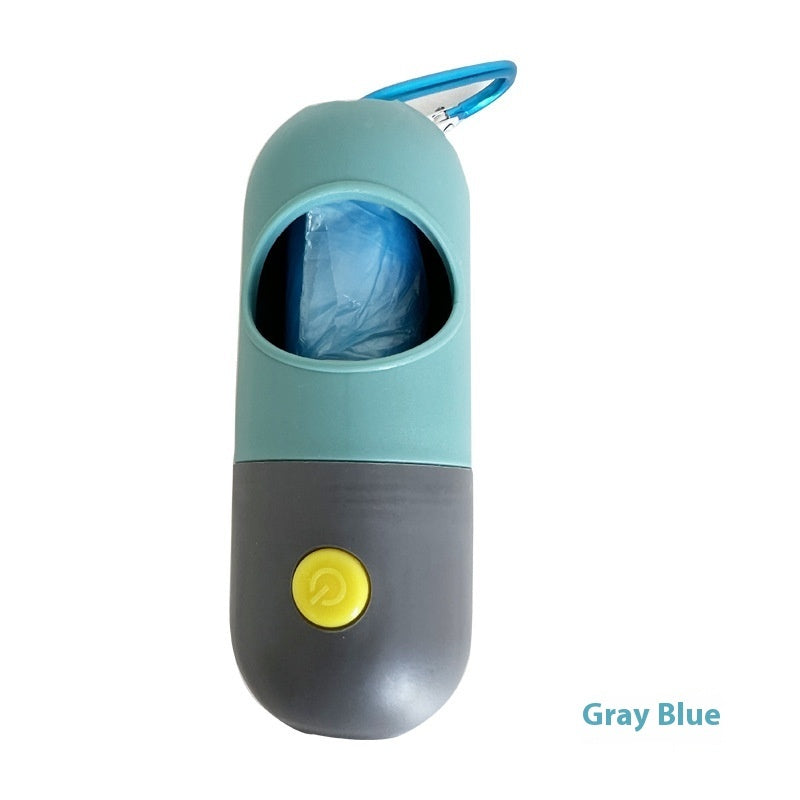 Gray-blue LED pet waste bag dispenser with carabiner, blue bag roll visible
