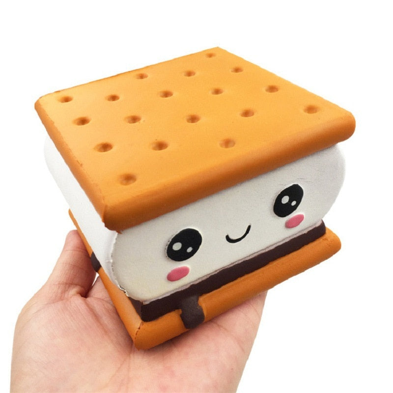 Handheld plush sandwich biscuit toy with panda face on white filling