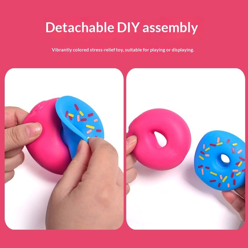 Hands squeezing a pink and blue squishy donut stress-relief toy, with detachable assembly shown