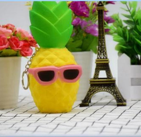 Slow-rising squishy toy yellow duck wearing black sunglasses