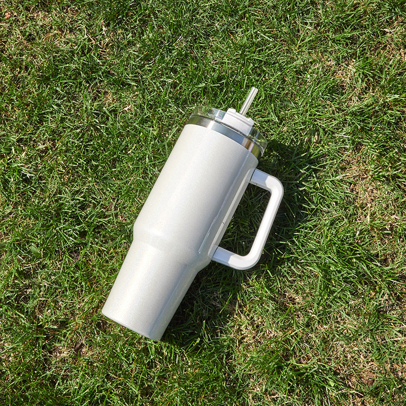 Large insulated stainless steel tumbler, white finish with clear lid and straw, handle