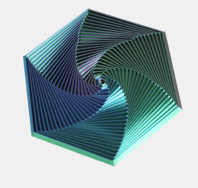 Hexagon sensory fidget toy with teal and green spiral ridges and a small dark core.