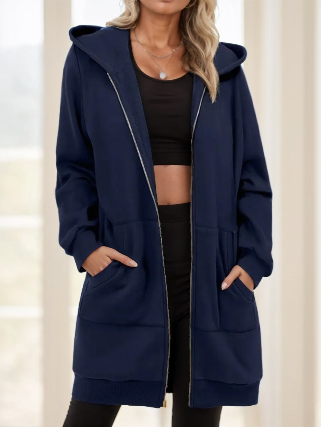 Women's navy long zip-up hoodie with hood and front pockets, full zipper closure