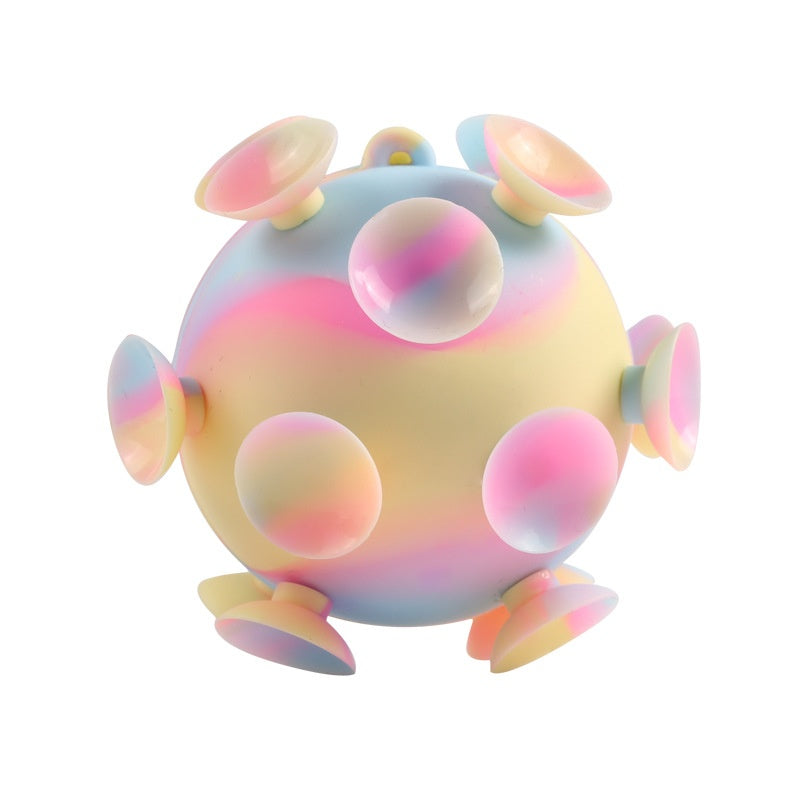 Pastel rainbow 3D silicone stress ball with rounded bumps and ear-like sides