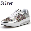 Women’s silver sequin lace-up sneakers with white laces and multicolor glitter side panels