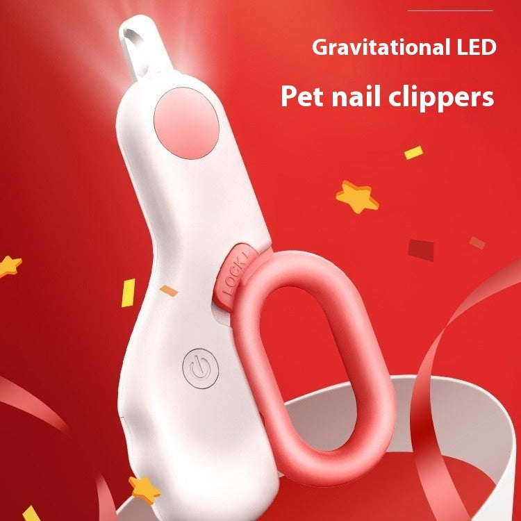 Pink and white LED pet nail clippers with teal light panel and finger ring grip
