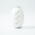 White reusable gel lint roller ball with ridged oval roller surface