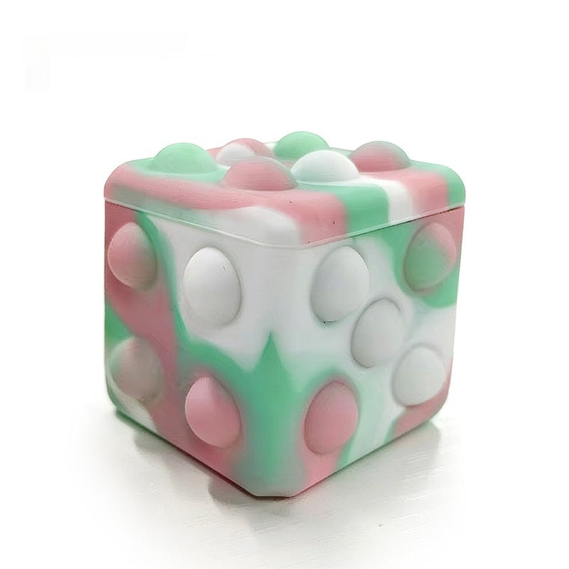 Square silicone bubble stress ball with pastel rainbow bumps, close-up front view