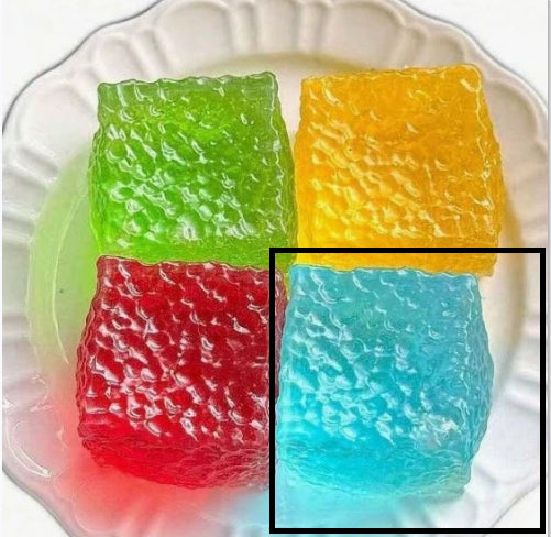 Blue translucent squishy cube highlighted; green, yellow, and red cubes included.
