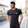Men's short-sleeve round-neck T-shirt, black, small chest shield logo on front