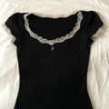 Black short-sleeve lace-trim T-shirt with scalloped neckline and small center button