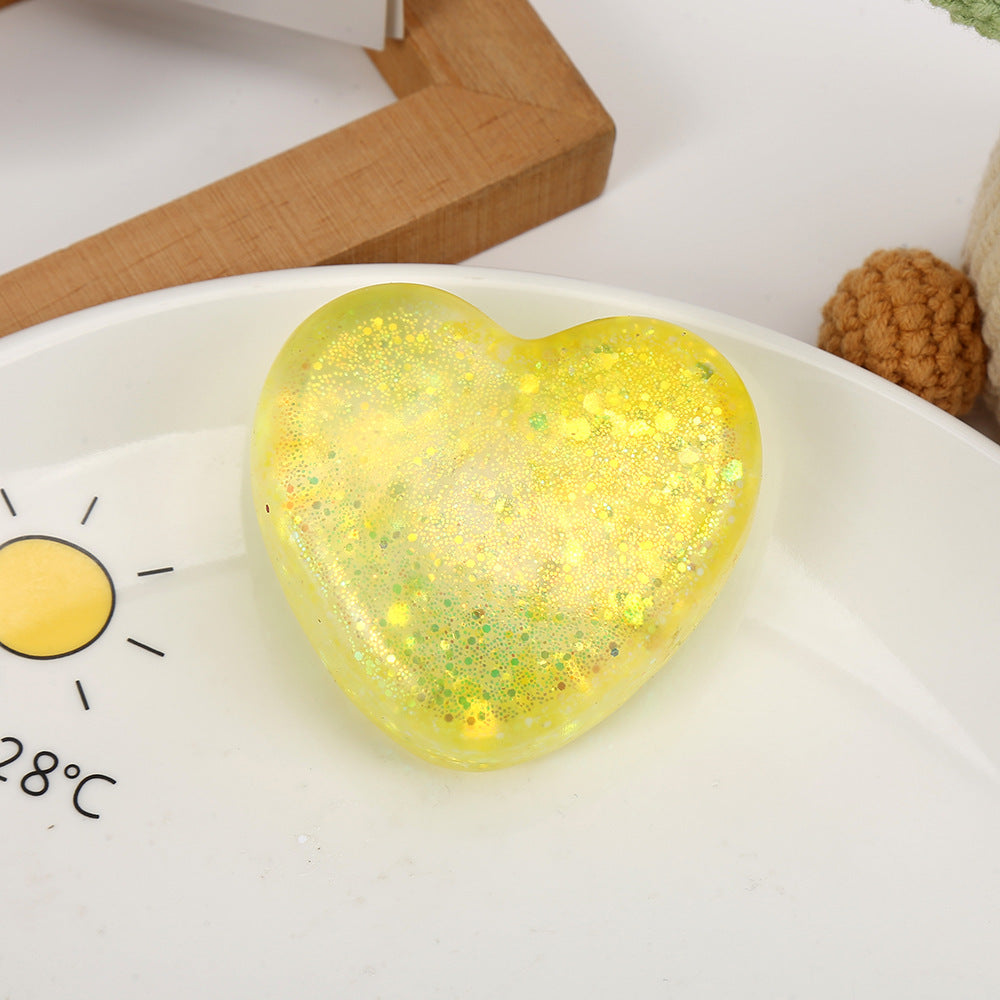 Yellow glitter heart squeeze stress toy