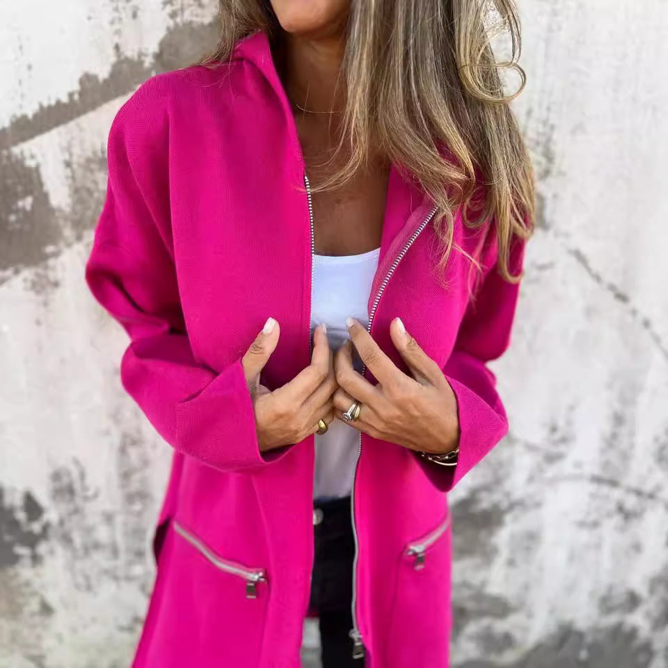 Women’s hot pink zip-up hooded cardigan, visible zipper and front pocket openings