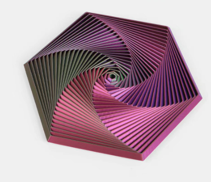 Hexagon sensory fidget toy with purple, pink, and maroon stacked ridges and spiral center