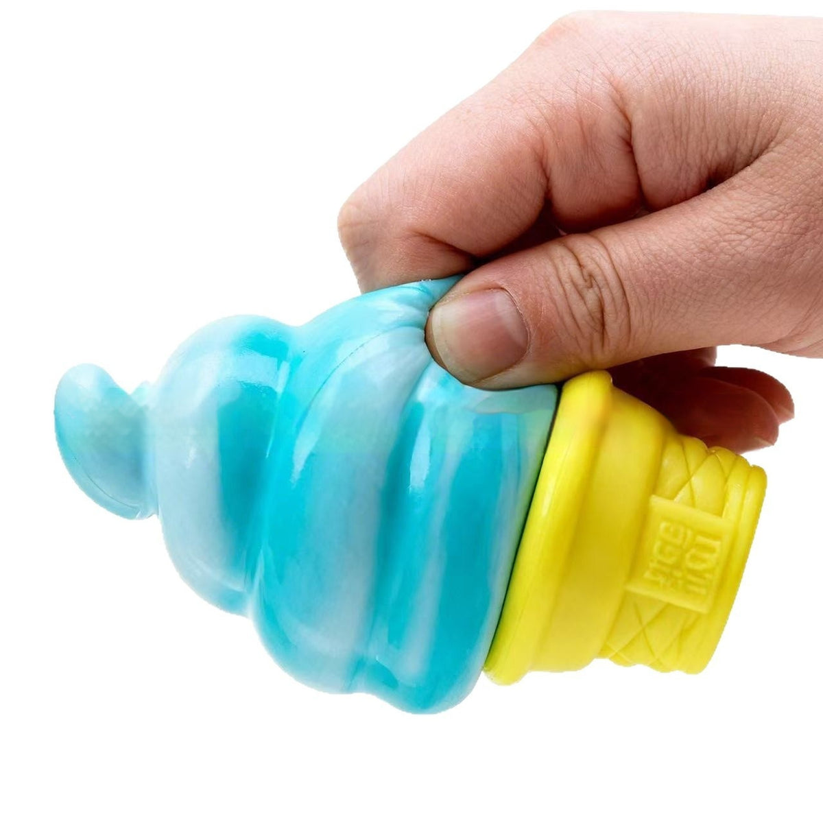 Blue ice cream-shaped stress toy with yellow cone, hand gripping the sides