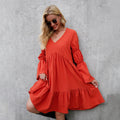 Orange printed cotton long-sleeve lounge dress, V-neck, tiered ruffle skirt.
