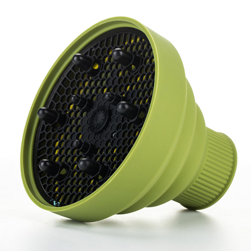 Green silicone folding hair diffuser with black hex mesh and multiple vent tabs