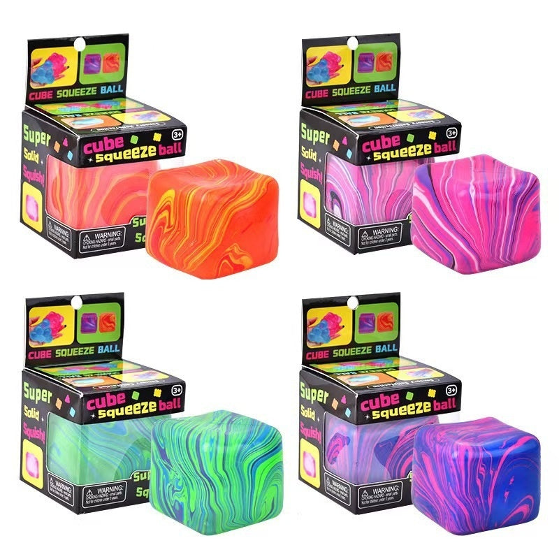 Boxed cube squeeze stress-relief toy with colorful swirled cube design