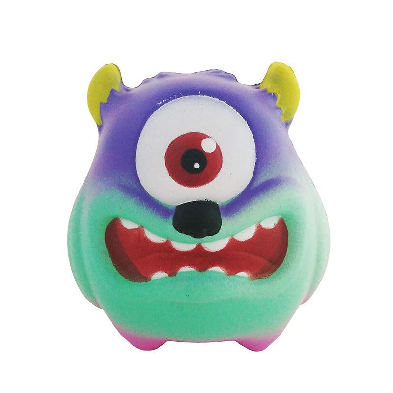Cute plush monster toy with purple and green swirl face, big red eye and smile.