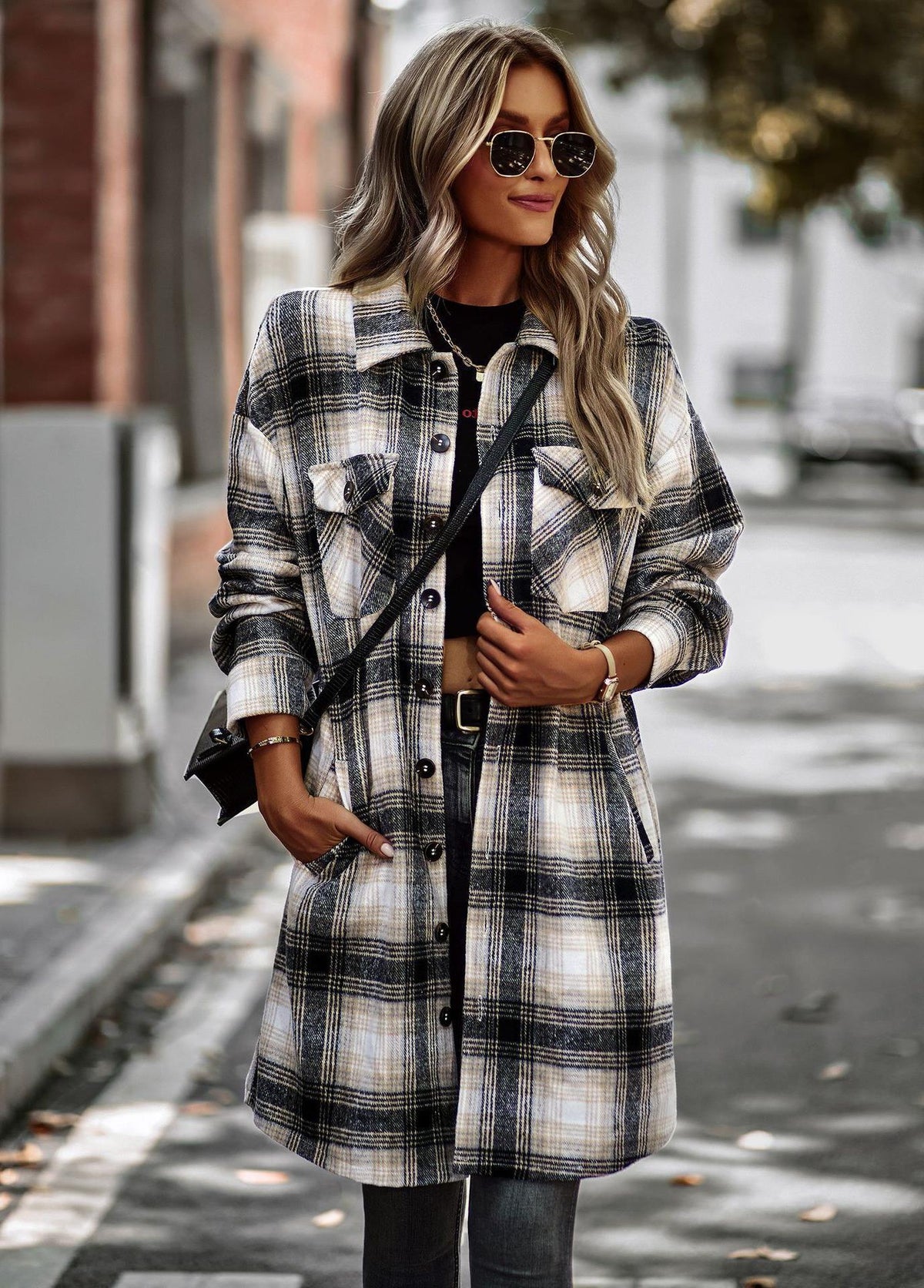 Plaid long cardigan coat in black, cream, and blue with button front and collar