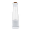 White electric juicer blender cup with ribbed clear body and gold-toned top