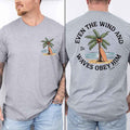 Heather gray unisex tee with palm tree graphic and back verse text "Even the Wind"