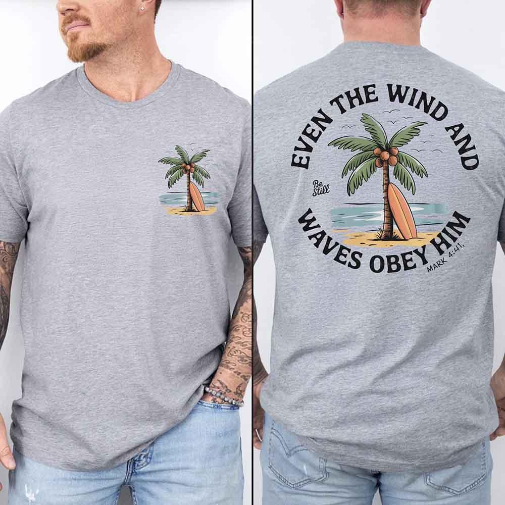Heather gray unisex tee with palm tree graphic and back verse text "Even the Wind"