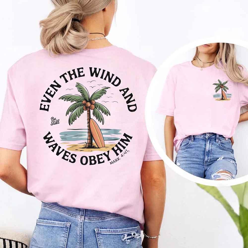 Pink unisex tee, back graphic featuring palm tree and verse text