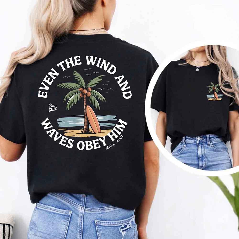 Black unisex tee, back graphic with palm tree and 'Waves Obey Him' text