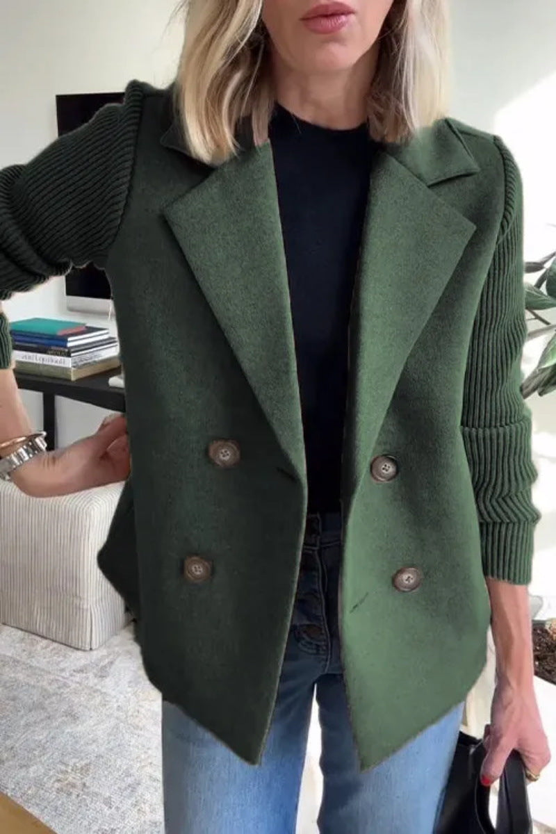 Dark green double-breasted lapel jacket with ribbed knit sleeves and four buttons.