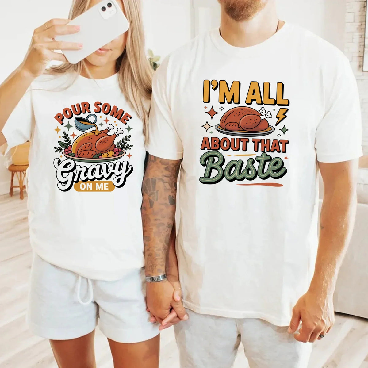 Pair of white Thanksgiving t-shirts: “Pour some Gravy on me” and “I’m all about that Baste”