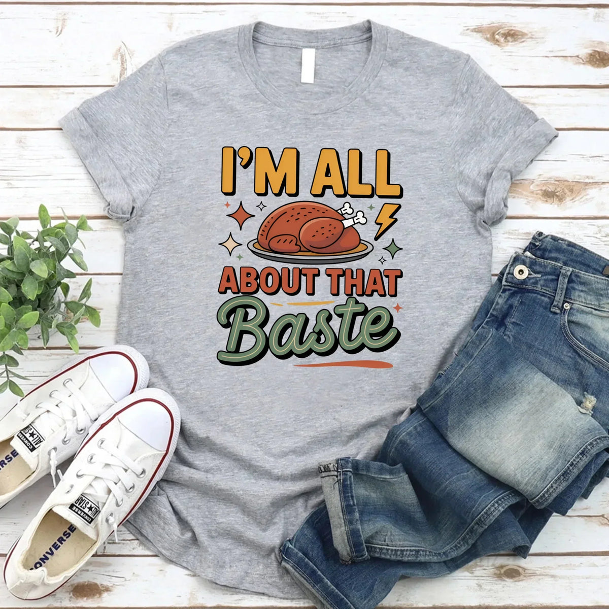 Heather gray Thanksgiving t-shirt with “I’m all about that Baste” turkey graphic