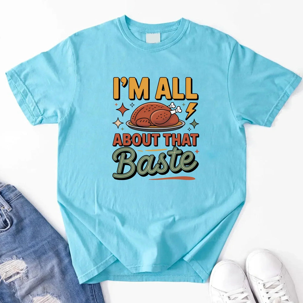 Light blue T-shirt with turkey gravy graphic reading “I’m all about that Baste”.
