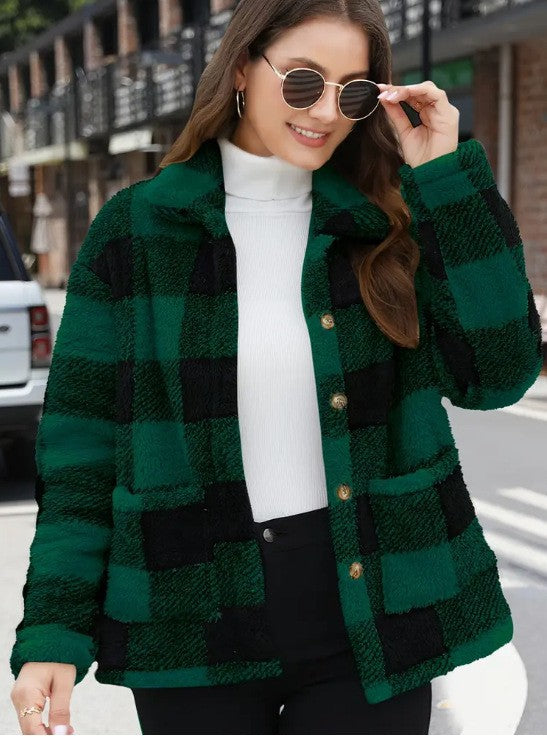 Women’s green and black plaid single-breasted jacket with button front and lapel collar.