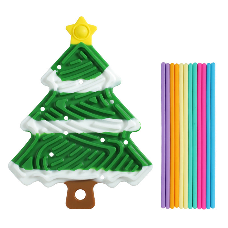 Green-and-white Christmas tree sensory board with yellow star top plus rainbow plastic straws