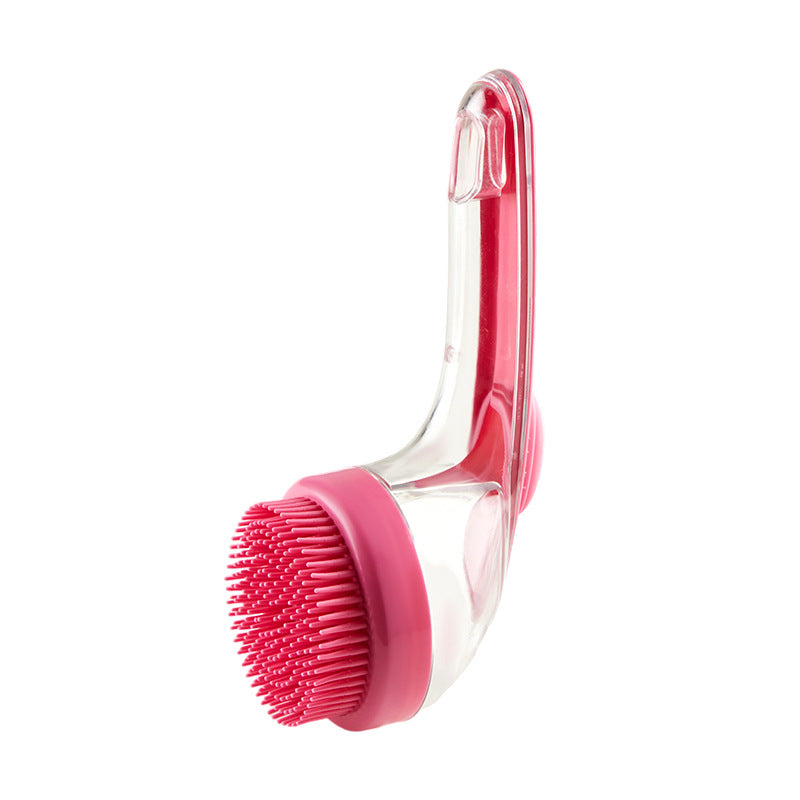Long-handle pet bath brush with red bristle head and clear curved handle