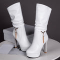White mid-calf boots with high heel and side metal tassel zipper accent