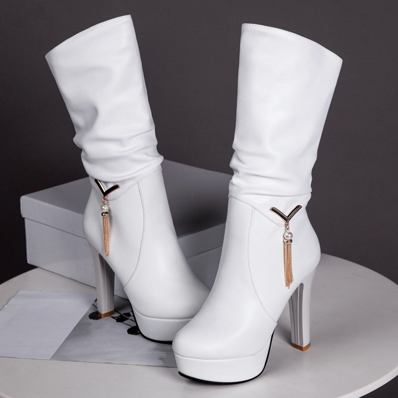 White mid-calf boots with high heel and side metal tassel zipper accent